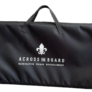 May include: Black canvas carrying case with a white logo that reads "Across the Board Handcrafted Unique Entertainment" and a white fleur-de-lis.