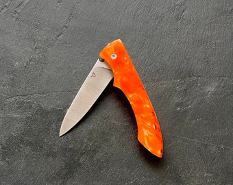 Phoenix Orange, resin handle and inclusion, light 100% French