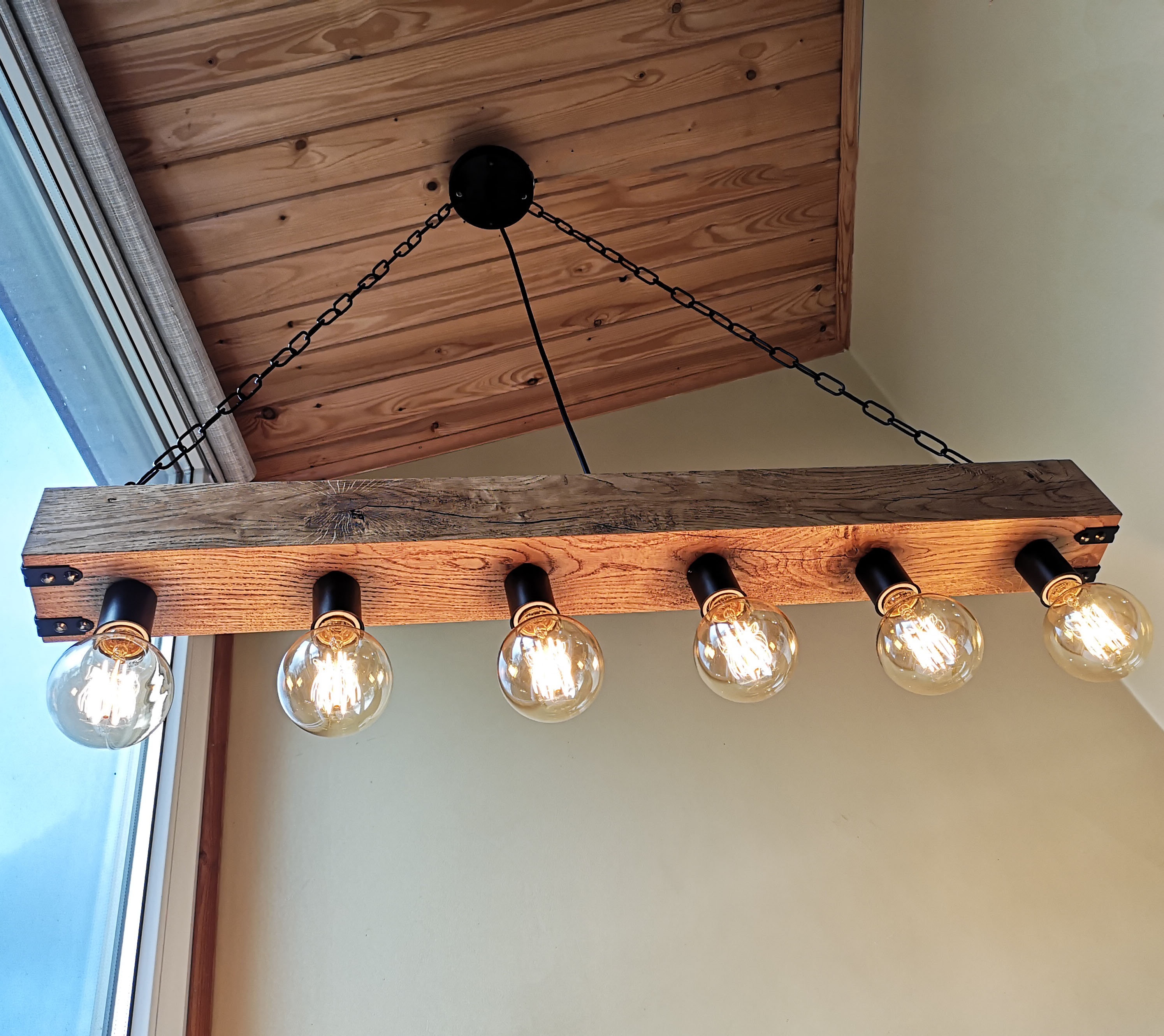 Handmade reclamed wood beam chandelier