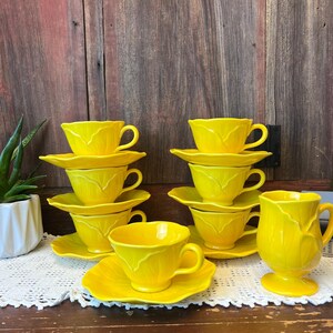 Lotus Bright Yellow Metlox Poppytrail Vernon Footed Tea Cup (7) and Saucer (7) Set plus Mug