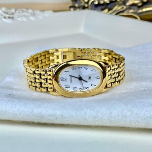 Montre Seiko Baignoire avec bracelet doré