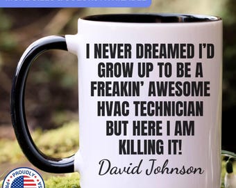May include: A white ceramic mug with a black handle and interior. The mug features black text that reads: I NEVER DREAMED I'D GROW UP TO BE A FREAKIN' AWESOME HVAC TECHNICIAN BUT HERE I AM KILLING IT! The name David Johnson is printed below the text.
