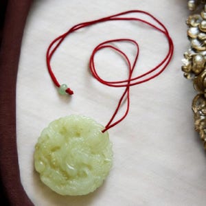 Carved Jade Pendant, Necklace, Light Green with Red Cord, Vintage.