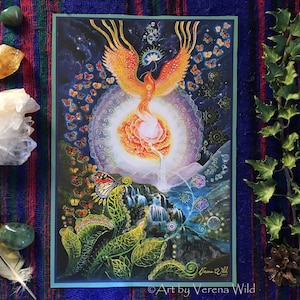 May include: A colorful print featuring a phoenix rising from a circle of butterflies, surrounded by a starry night sky. The phoenix is orange and yellow with a red tail, and the butterflies are a variety of colors. The print is set against a background of green mountains and waterfalls.
