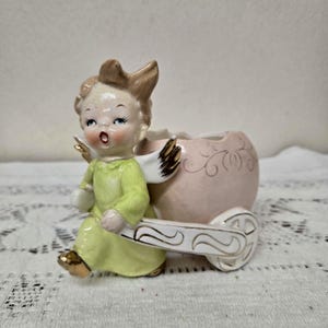 Repaired Napco Boy Angel Pulling Easter Egg Cart Planter As Is