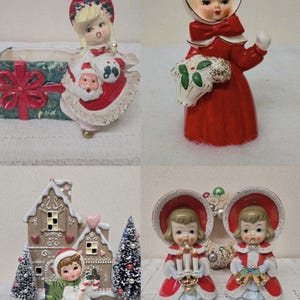 May include: A collection of vintage Christmas figurines. The figurines include a girl in a red coat, a girl in a Santa-themed dress, and two girls holding candles. A gingerbread house and Christmas trees are also present.