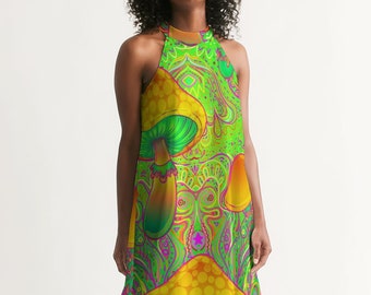 May include: A green and yellow halter dress with a psychedelic mushroom print. The dress has a flowing, A-line silhouette and a halter neckline.