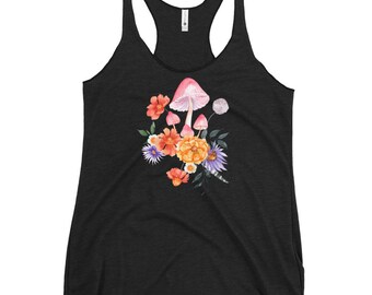 May include: A black tank top with a watercolor illustration of pink mushrooms and orange, yellow, and purple flowers.