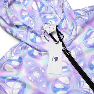 May include: A white jacket with a purple and blue abstract pattern. The jacket has a black zipper and a white tag with the text "SUPERHUMAN" and a graphic of a brain.
