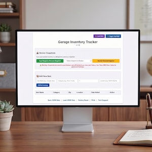 May include: A computer monitor displaying a "Garage Inventory Tracker" interface sits on a wooden desk. A desk lamp, a succulent in a pot, and an open notebook with a pen are also on the desk. A bookshelf is in the background.