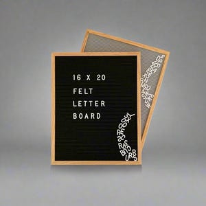 May include: A black felt letter board with a wooden frame. The board is 16 x 20 inches and has the words "Felt Letter Board" written on it. There are white plastic letters scattered around the board.