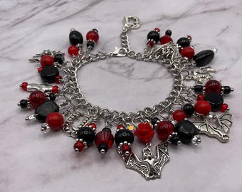Vampire multi charm red, black & silver tone chain bracelet. Vampire fang bracelet. Spooky bracelet. Bat bracelet. Halloween gift