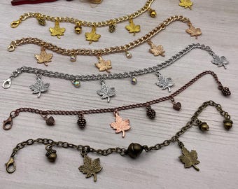 Maple leaf charm chain link bracelet. Golden, silver, copper and bronze tone autumn bracelet. Acorn and pinecone charm link chain bracelet