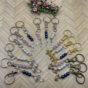 Religious keyring beaded charm. Angel, Blessed, Peace dove keychain charm. Bag clip charm. Backpack charm. Purse clip on charm. Perfect gift