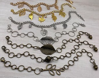 Fall, Autumn link chain charm bracelet. Antique bronze, silver and golden tone chain autumn bracelet. Maple leaf, pinecone & acorn bracelet.