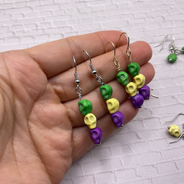 Mardi Gras skull earrings. New Orleans white skull earring. Carnival green, yellow & purple skull earrings. Louisiana Voodoo skull earrings