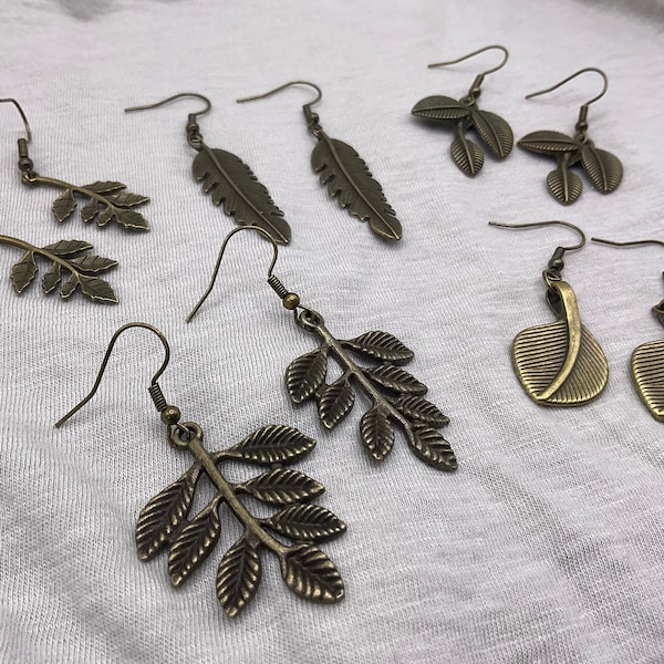 Fall leaf bronze leaf earrings. Assorted tree leaf charms antique bronze tone. Handmade Autumn earring set. Feather earrings