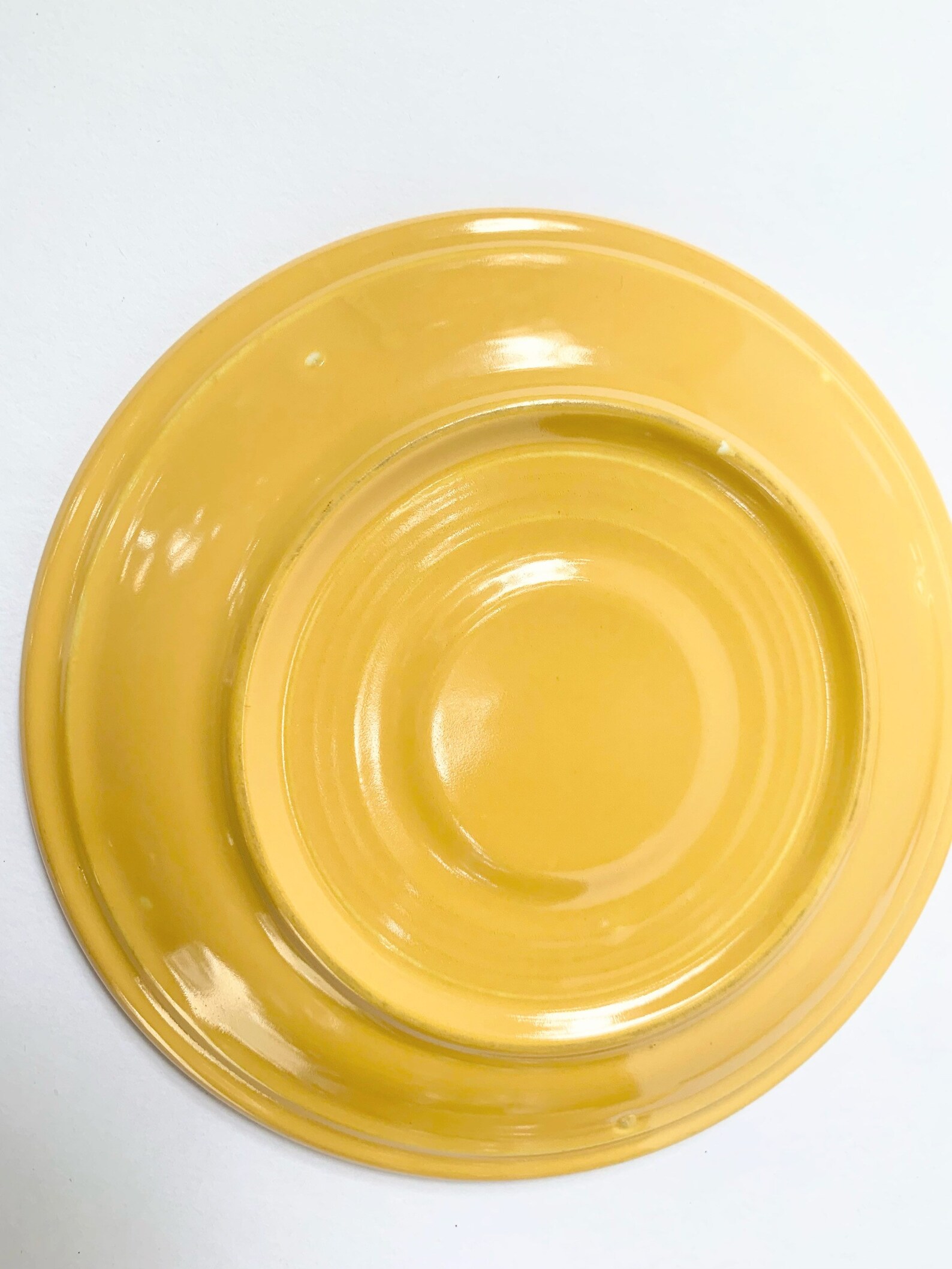 Lot of 4 marigold yellow saucers 2 Fiestaware 2 knockoffs Etsy