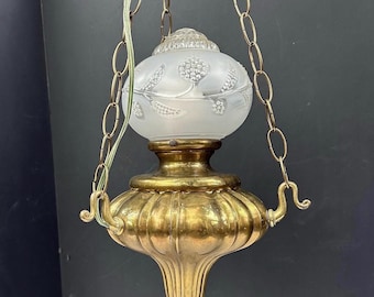 Vintage Art Nouveau-style brass pendant light with glass onion shade