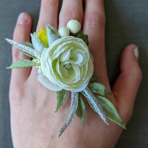 off white bud, green & silver accents; Corsage ring or wristlet; artficial