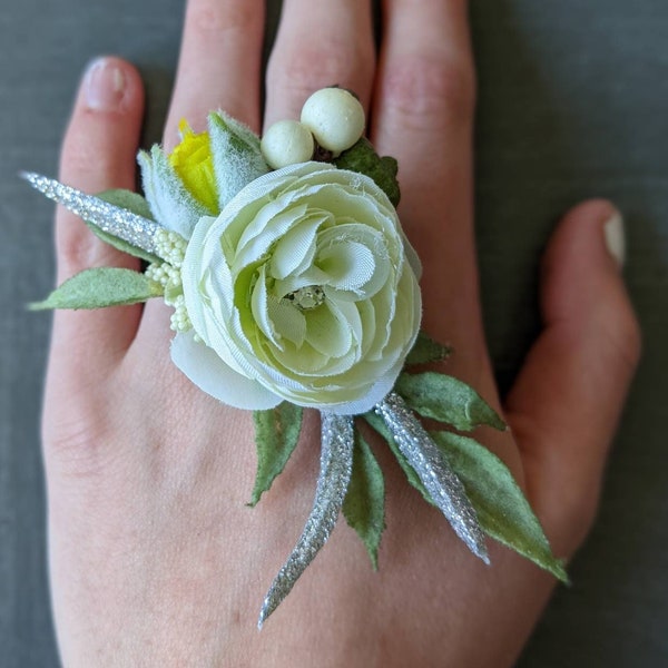 off white bud, green & silver accents; Corsage ring or wristlet; artficial