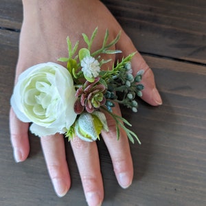 White bud, green&  burg accents; Corsage ring or wristlet; artificial