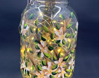 Off-White Dogwood Large 32oz Glass Fairy jar lantern solar lights w/handle, Off-White floral blooms painted all around, garden decoration