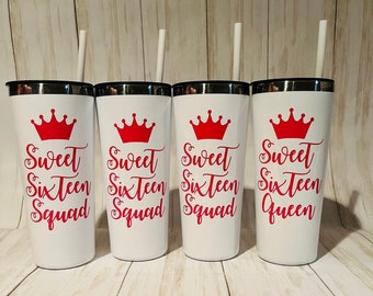 May include: Four white stainless steel tumblers with black lids and red crowns and text. The tumblers have straws and say "Sweet Sixteen Squad" and "Sweet Sixteen Queen".