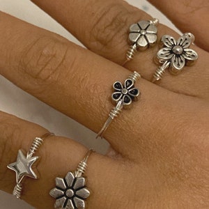 silver band flower and star ring !