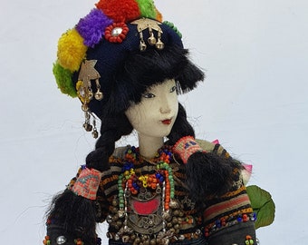 Beautiful Mountain Tribal Doll. A rare item of a girl puppet village beauty.  A antique hand puppet with pom pom by Theater Art Gallery
