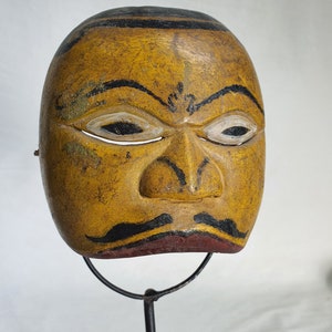 Yellow mask antique collection, primitive mask by Theater Art Gallery in Bali