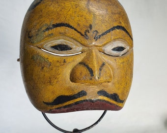 Yellow mask antique collection, primitive mask by Theater Art Gallery in Bali