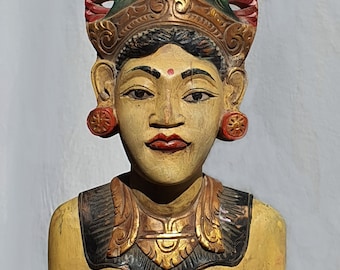 Old balinese carving:  Female Janger Dancer