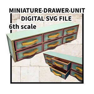 May include: A miniature wooden drawer unit with six drawers, each with a gold handle. The unit is painted a light blue colour with a red trim around each drawer. The drawer unit is 6th scale.