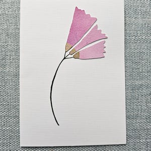 Three petal flower handmade card with original watercolour painted collage pieces