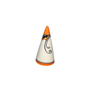 May include: A white, cone-shaped decorative object with orange and black accents. The top is orange, and the base has an orange stripe. Black, stylized floral designs adorn the white body. This item is likely a decorative piece or a unique accessory.