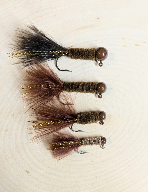 bass lures mop jig Buckeye Mini Green Pumpkin / 3/8 oz Its tied the same way as the original Buckeye Mop Jig SnaggleProof Weedless Jig