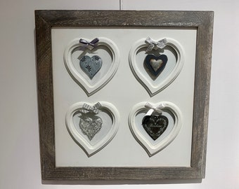 gray and white painting and its hearts