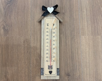 Wooden and black thermometer to hang