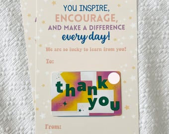 May include: A thank you card with a colorful sticker that says "thank you". The card has a pink background with white stars and the text "You inspire, encourage, and make a difference every day! We are so lucky to learn from you!" in blue and black text.
