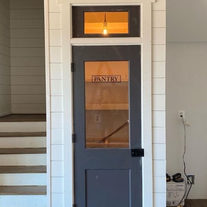 Transom window, interior window, fanlight, crossbeam , above door
