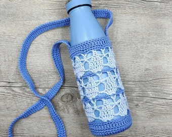 May include: A blue water bottle with a crocheted blue and white cover and a matching blue strap.