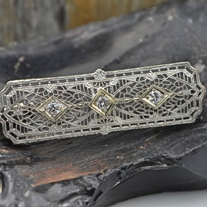 Early 1920's Platinum & 14k Gold Filigree Brooch, with 3 European Mine Cut DIamonds