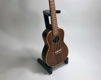 black wooden ukulele stand