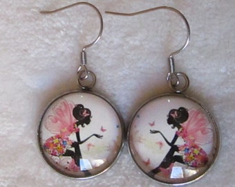 women's face earrings