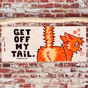 May include: Orange cat with a white tail, looking angry and saying "GET OFF MY TAIL." The cat is on a white background with the text "EASY PEEL!!" and "CHOWFUR.COM" at the top and "looking for more CHOWFUR.COM" at the bottom.