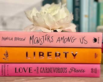 Orange and Pink Decorative Book Stack