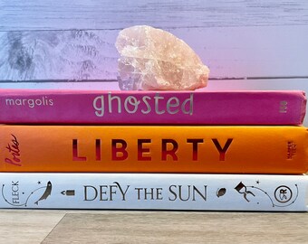 Pink and Orange Decorative Book Stack