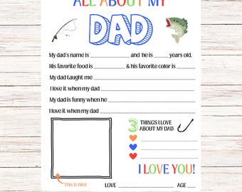 May include: A white 8.5" x 11" printable "All About My Dad" questionnaire. The design includes a fishing rod, a fish, and fill-in-the-blank sections for personal details, favorite things, and a space for a photo. It also says "I Love You!"