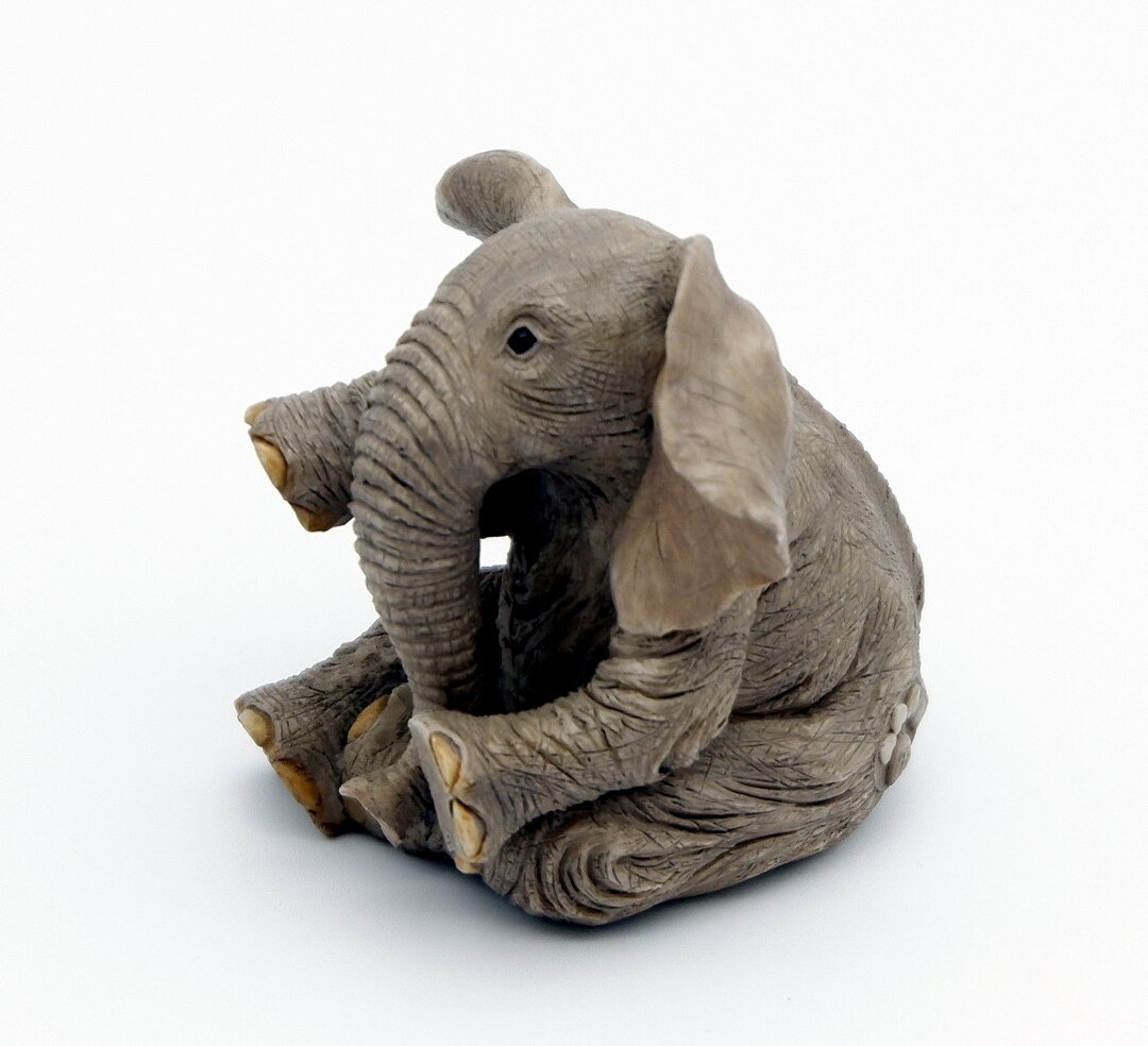 Tuskers Baby Elephant Sitting Figurine Ornament Handmade and Hand
